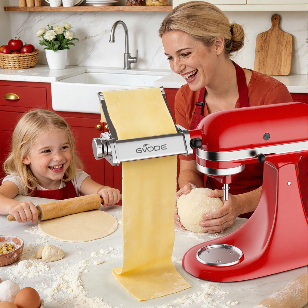 Woman and child making pasta with Gvode roller attachment on red stand mixer