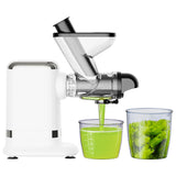 White Gvode cold press juicer separating green juice and pulp into two containers
