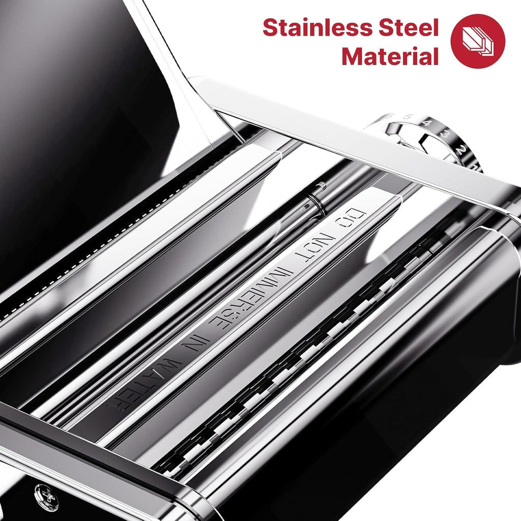 Close-up of stainless steel pasta rollers and cutters inside the Gvode electric pasta maker
