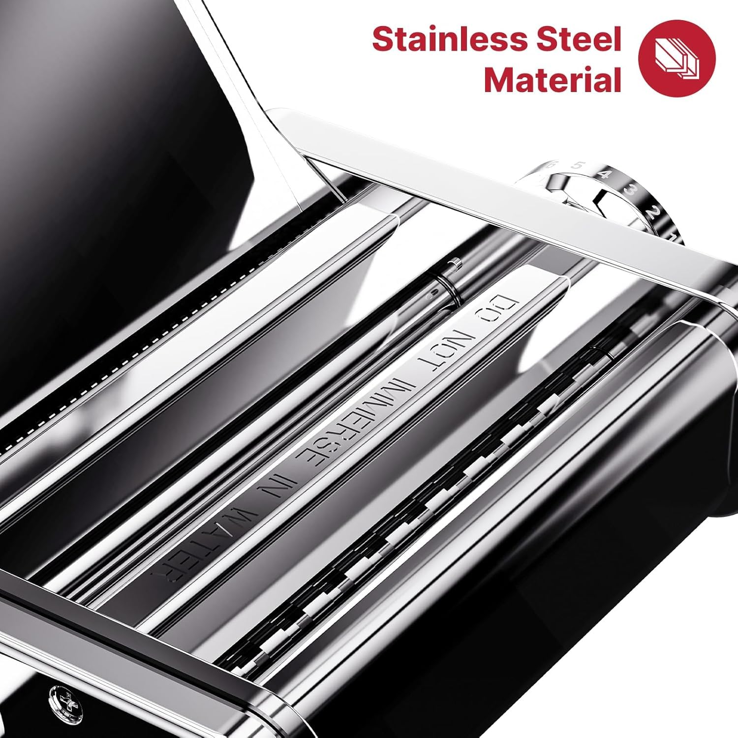 Close-up of stainless steel pasta rollers and cutters inside the Gvode electric pasta maker